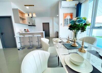 Modern kitchen with dining area and elegant decorations