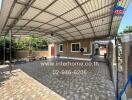 Spacious covered outdoor patio area with seating and ample shade