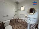 Spacious modern bathroom with white tiles and a small window