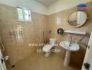 Modern bathroom with beige tiles and natural light