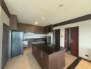 Spacious modern kitchen with center island and high-end appliances