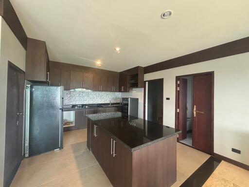 Spacious modern kitchen with center island and high-end appliances