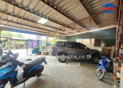 Spacious covered garage with multiple vehicles
