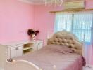 Elegant pink bedroom with luxurious decor