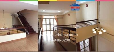 Spacious hallway and stairwell area of a modern home