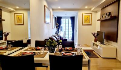 Elegant living room with dining area in modern apartment