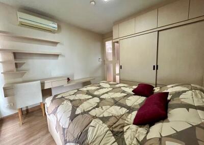 Spacious bedroom with modern design and ample storage
