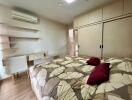 Spacious bedroom with modern design and ample storage