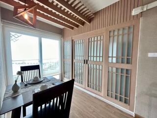 Elegant dining room with ocean view and stylish interior design