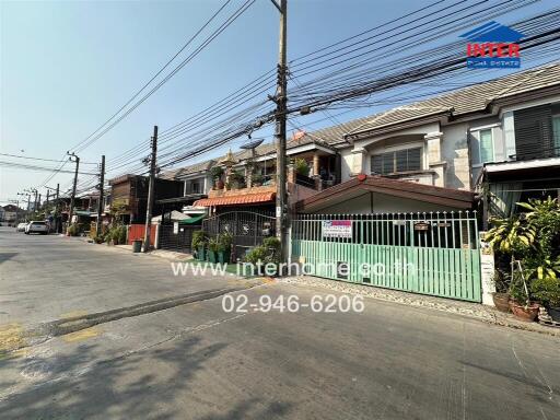 Suburban street view with residential townhouses