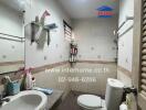 Spacious bathroom with modern amenities in a real estate property