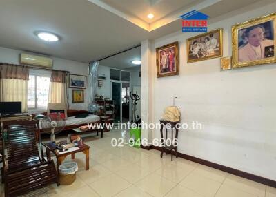 Spacious and well-furnished bedroom with adequate lighting