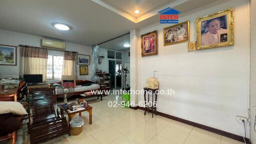 Spacious and well-furnished bedroom with adequate lighting