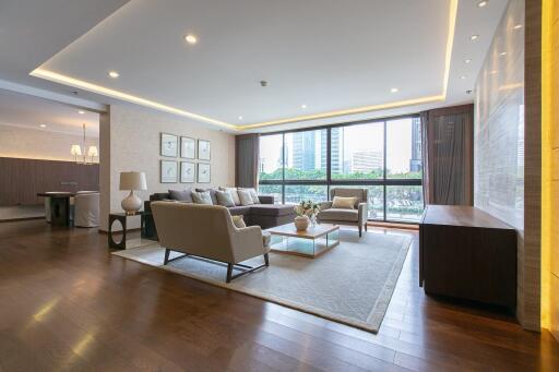 Spacious modern living room with elegant furnishings and ample natural light