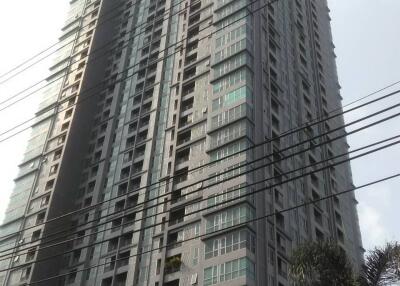 Exterior view of a modern high-rise residential building