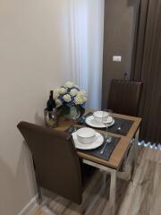 Elegant dining area with set table and ambient lighting