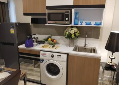 Modern kitchen with appliances and decorated countertop