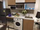 Modern kitchen with appliances and decorated countertop