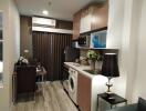 Modern compact kitchen with integrated appliances and dining area