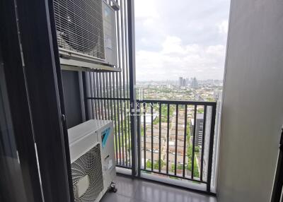 High-rise apartment balcony overlooking the city