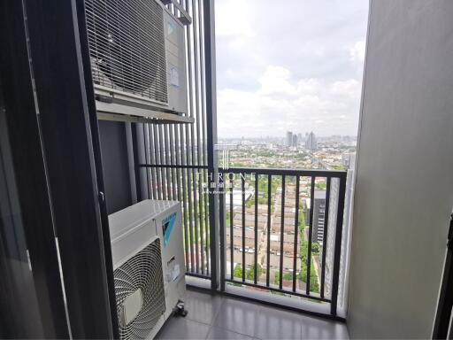 High-rise apartment balcony overlooking the city