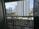 High-rise city view from the balcony of an apartment