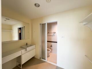 Spacious bathroom with separate shower area