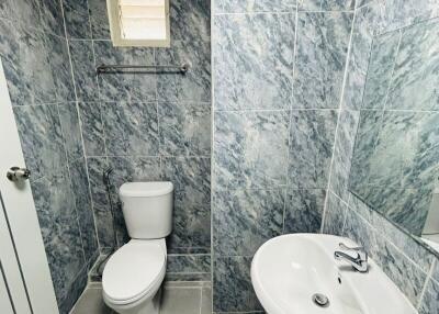 Modern bathroom with marble tiles