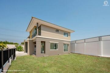 Modern two-story house with spacious backyard lawn