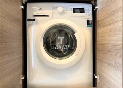 Compact built-in washing machine in a modern home