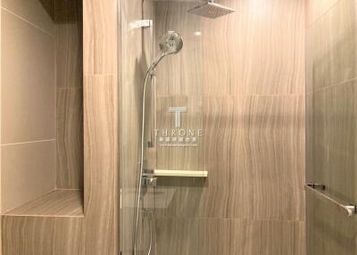 Modern bathroom with elegant shower and luxurious finishes