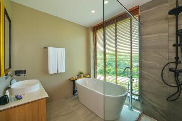 Modern bathroom with natural light and luxurious fixtures