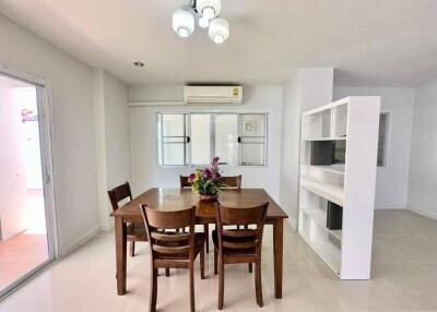 Spacious living room with dining area and modern furnishings