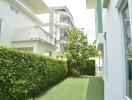 Modern residential home exterior with landscaped pathway