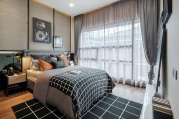 Well-appointed modern bedroom with ample natural light