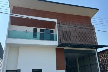Modern two-storey house with balconies