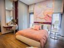 Elegant bedroom with stylish decor and artwork