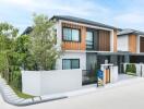Modern residential townhouses with green landscaping