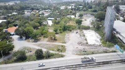 Aerial view of a potential development site near a busy road