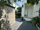 Spacious and well-maintained front yard of a modern home with greenery