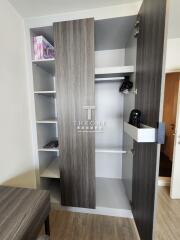 Modern bedroom with stylish built-in wardrobe