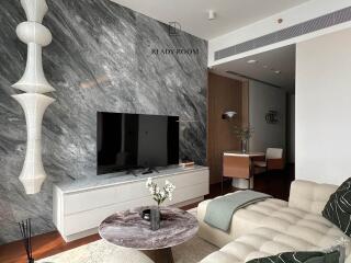 Modern living room with marble walls and elegant design