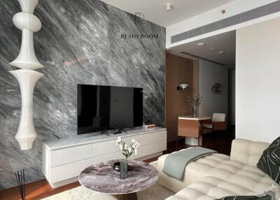 Elegant and modern living room with marble wall