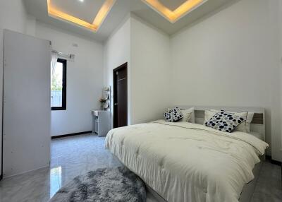 Modern bedroom with ambient lighting and elegant interior design