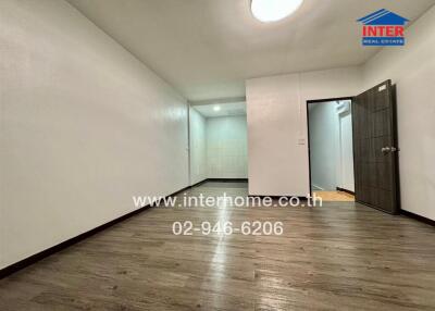 Spacious and well-lit empty bedroom in modern apartment