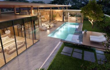 Luxurious backyard with swimming pool and glass-walled living spaces at dusk