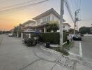 Suburban two-story house at sunset