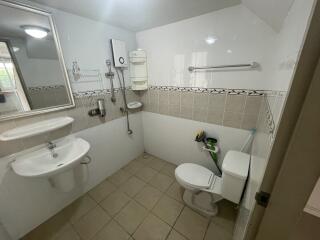 Modern bathroom with white fixtures and clean design