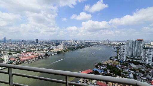 Stunning city and river view from high-rise balcony