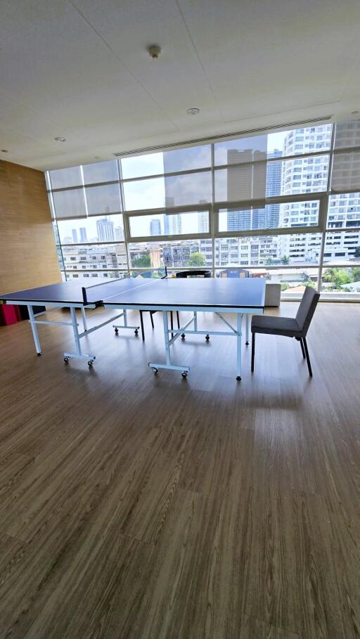 Modern office space with large windows and city view